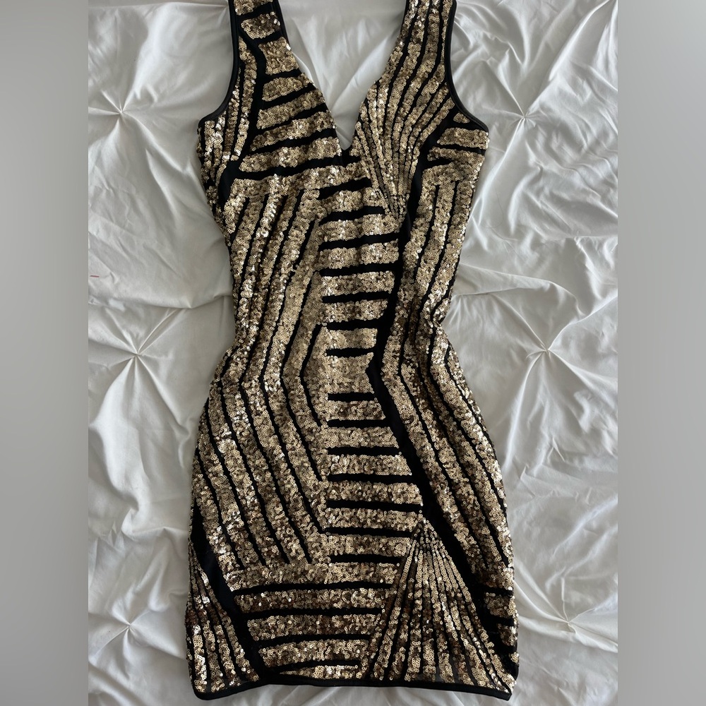Elegant Black and Gold Sequin Dress